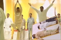 Andhra cm ministers perform yoga in vijayawada