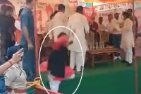 Bjp leader falls off stage while cheering for madhya pradesh cm shivraj singh chouhan