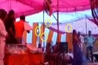 Bjp mla captured on video showering currency notes on dancers