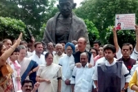 The opposition congress appeared unrelenting protesting in the well of the rajya sabha