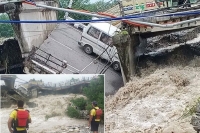 Dehradun rishikesh bridge collapses road caves in as heavy rainfall lashes uttarakhand