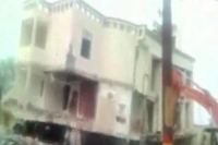 Hotel building collapses within minutes