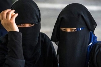 Switzerland enforces burqa ban