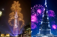 Dubai burj khalifa show marks start of new year 2015 with sparkle