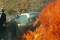 Good samaritans rescue couple in their 90s from burning car