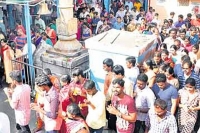 Parents of indian americans and nris relatives offer prayers to lord balaji for their relatives in america