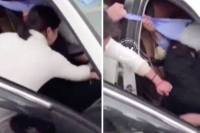 Jilted wife whips semi naked love rival after catching her in the act with husband