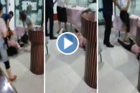 Furious wives attacking woman at restaurant in china