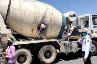 18 migrant workers found travelling in a cement mixing truck