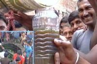 Oil found in a well locals throng to claim their share