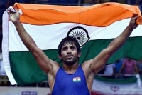 Cwg 2018 bajrang punia storms to wrestling gold silver for pooja dhanda