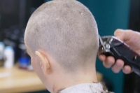 Dad makes 16 year old daughter shave her head after she bullies a girl with cancer