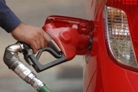 Petrol and diesel prices record new highs diesel breaches 70 mark in new delhi
