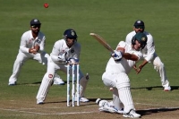 Umesh yadav shines but defiant mitchell starc takes australia to 256 9