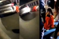 Woman dragged by moving car in delhi s amar colony spine chilling video goes viral