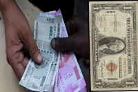 Rupee crashes to all time low of rs71 against dollar