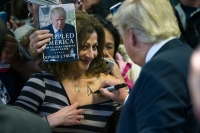 Trump signs woman s chest at rally