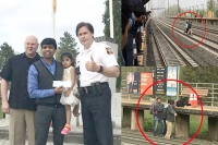 Police reward samaritan robbed rescuing woman from train tracks