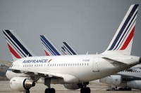 Woman hides child in hand luggage on flight to paris