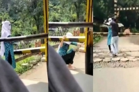 Woman attempts to end life by standing on rail tracks brave auto driver saves her