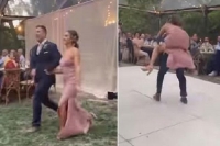 Viral video groom piggybacks bride misses balance while dancing