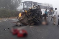 4 students killed after auto hit by rtc bus in guntur
