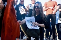 Anti hijab revolution hits iran women chop hair burn hijabs in war against moral police