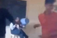 Karnataka students assault teacher put dustbin on head probe ordered