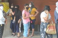 Women queued up in front of liquor shops in hyderabad