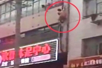 Naked man falls from building after caught cheating
