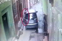 Woman tossing baby girl into the street from car window in muzaffarnagar