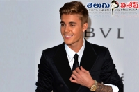 Justin bieber apologizes for posting nude photo
