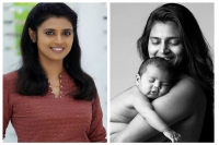 Actress poses seminude for motherhood project