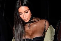 Kim kardashian west held up at gunpoint in paris hotel room