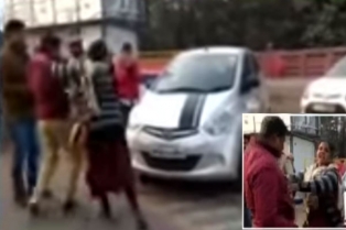 ITEMVIDEOS: ఎవడ్రా ఛలానా వేసేదీ అంటూ మహిళ వీరంగం.. 
