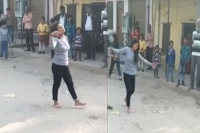 Girl dumped by lover dances to bollywood song outside his house