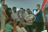 Shoe hurled at stage during maharashtra cm devendra fadnavis speech