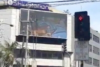 Giant billboard shows porn in makati city centre