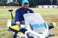 Ms dhoni rides policeman s bike