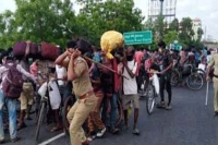 Coronavirus migrant workers lathi charged at tadepalligudem of guntur