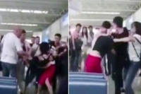 Wife strips mistress after catching husband cheating