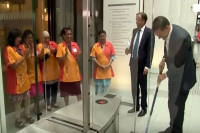 Netherlands pm mark rutte spills coffee on the floor cleans up the mess