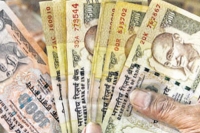 Rbi puts curbs on deposits above r5 000