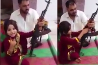 Pak girl fires ak 47 threatens modi
