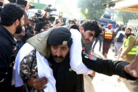 Burqa clad suicide bombers storm student dorm in pakistan 9 killed