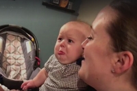 Jealous baby starts crying every time parents kiss and it s just adorable