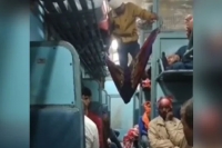 Viral video man makes his own jugaad train seat leaves passengers dumbstruck