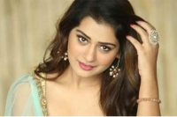 Actress payal rajput in trouble for opening peddapalli mall without wearing mask