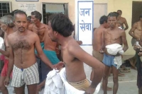 Madhya pradesh cops accused of thrashing and making farmers strip down