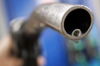 Petrol price hiked by 64 paise a litre diesel price cut by rs 1 35